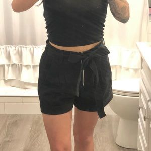 Express faux leather high rise tie shorts